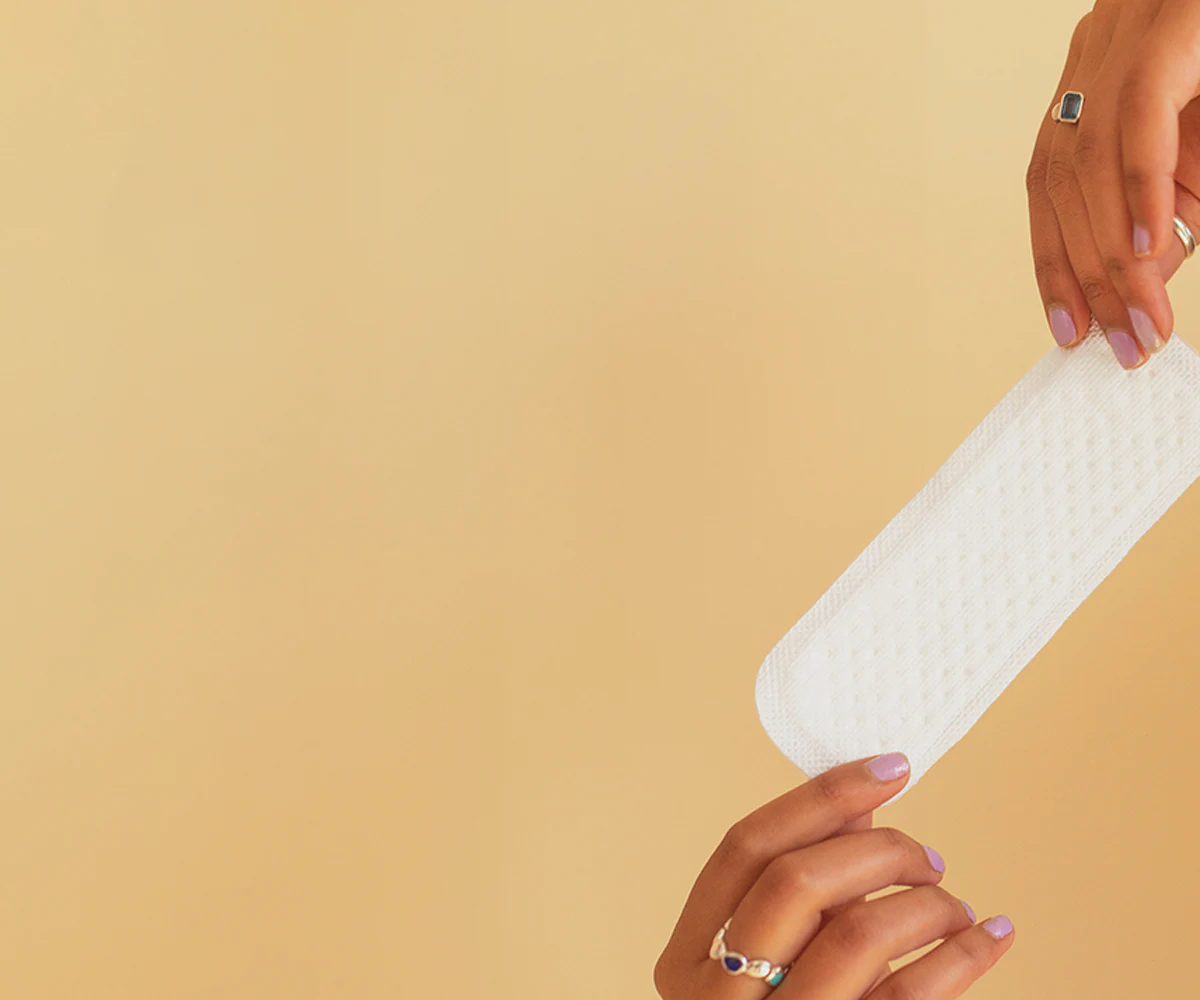 hands holding a pad