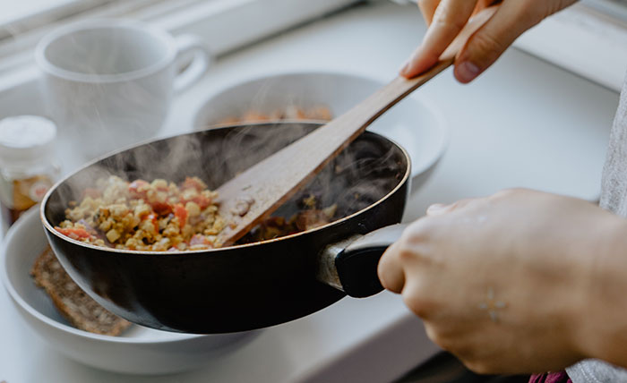 scrambled tofu being served up